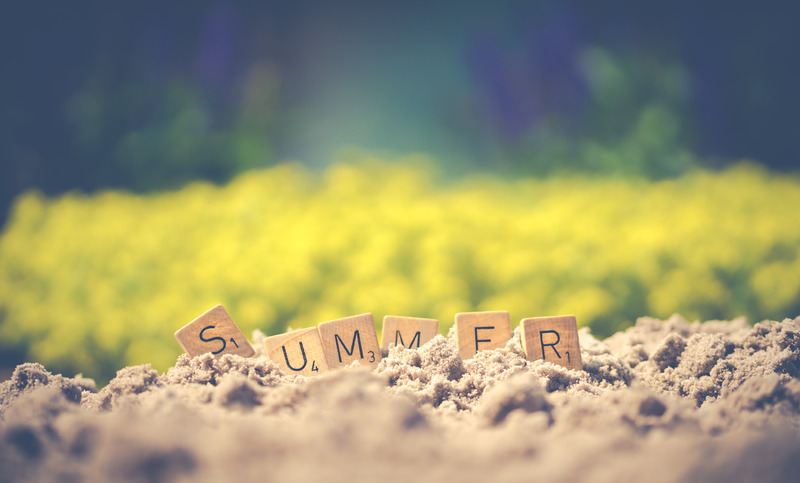 Canva - Summer Written in Sand